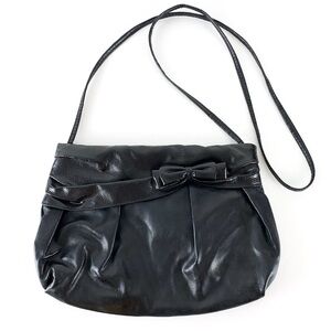 Vintage black bow crossbody bag by Pacific Connections faux leather & lizard